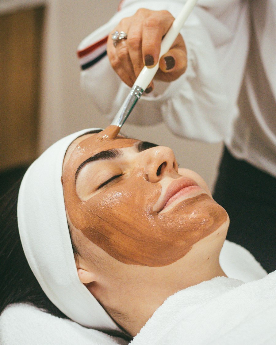 A client relaxing during a facial treatment